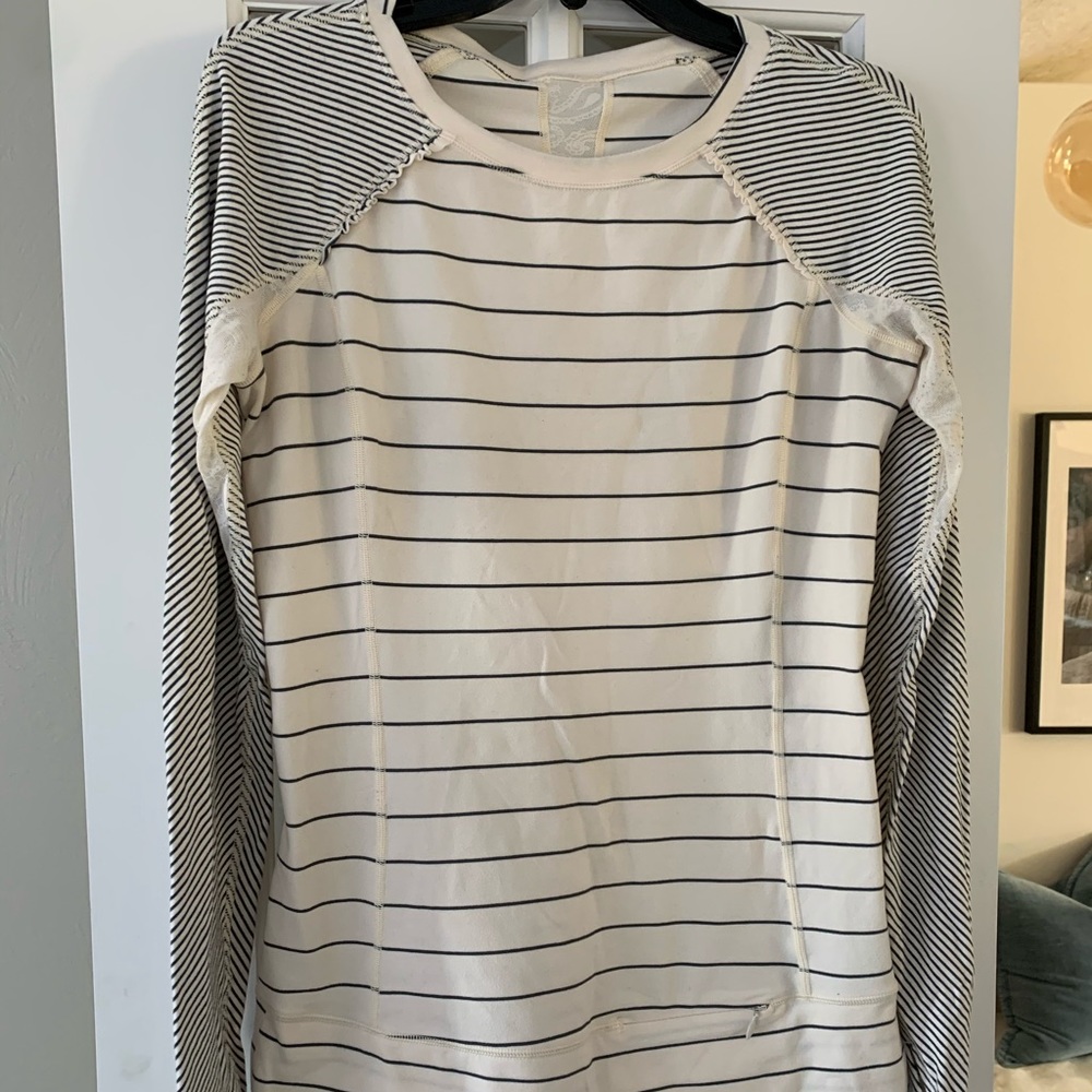 Lululemon ivory top with lace and ruffle detail